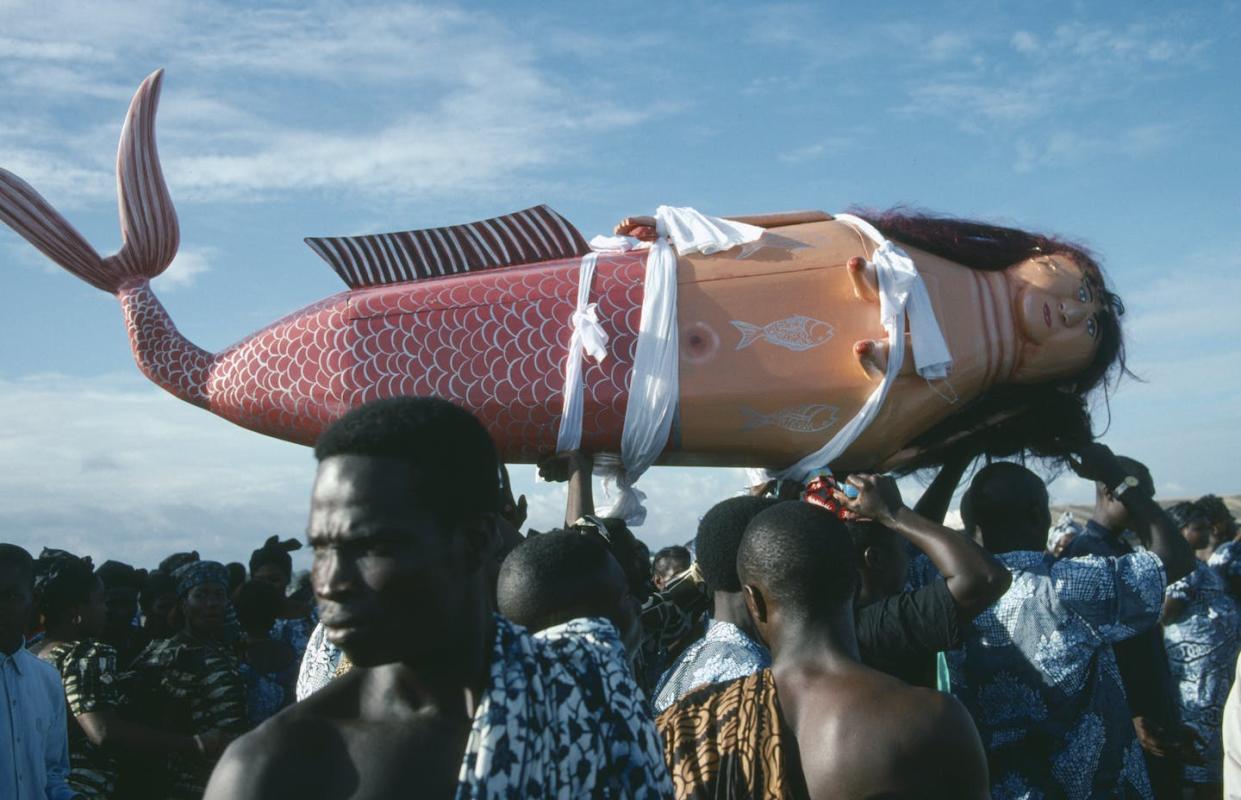 A coffin made to resemble a mermaid at a Ga funeral. The Ga people live along the southeast coast of Ghana. <span>Eye Ubiquitous/Universal Images Group via Getty Images</span>