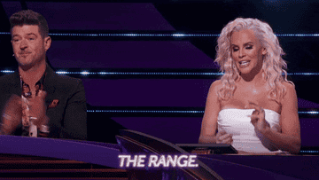 judges from "the masked singer" clapping and saying "the range"