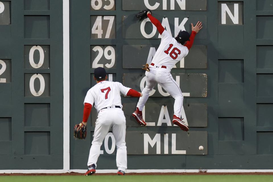 Boston Red Sox's Jarren Duran (16) cannot field an RBI-double by Cleveland Guardians' Josh Bell in front of teammate Masataka Yoshida (7) during the first inning of a baseball game, Friday, April 28, 2023, in Boston. (AP Photo/Michael Dwyer)