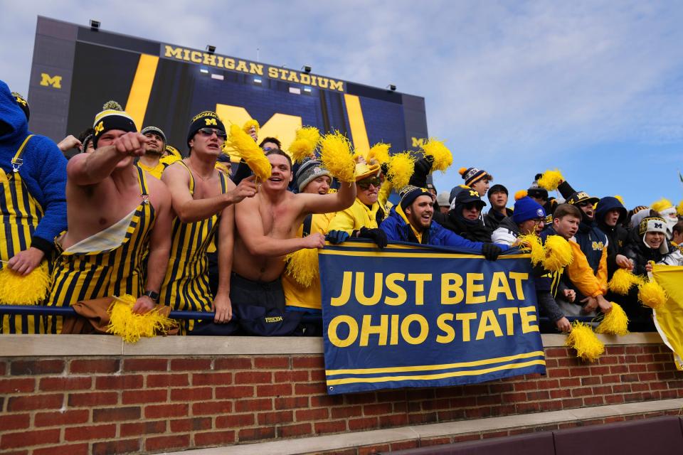 Michigan fans cheer during the Wolverines 30-24 win over Ohio State.