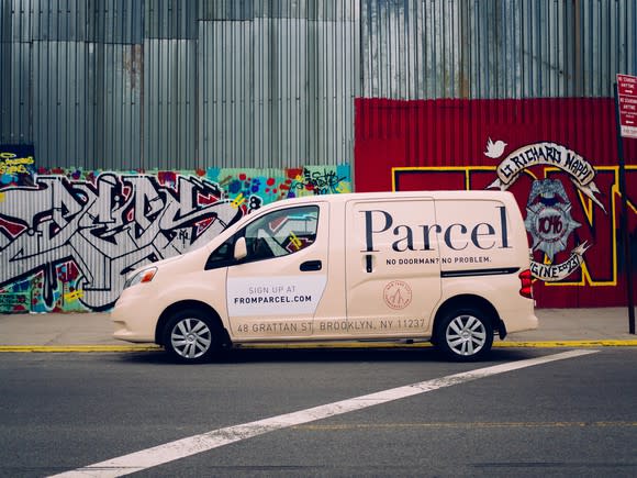 A Parcel van parked on the street.