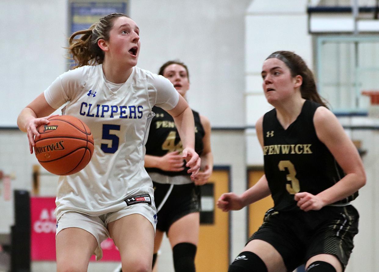 Norwell's Chloe Richardson drives to the basket during an Elite Eight game in the state tournament against Bishop Fenwick on Friday, March 11, 2022.