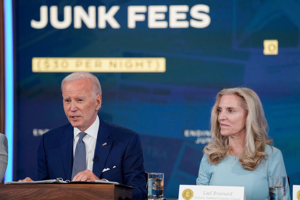 President Joe Biden speaks in the South Court Auditorium on the White House complex in Washington, Thursday, June 15, 2023, to highlight his administration's push to end so-called junk fees that surprise customers. Lael Brainard, Assistant to the President and Director of the National Economic Council, listens at right. (AP Photo/Susan Walsh) ORG XMIT: DCSW419