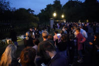 <p>Mourners gather laying flowers outside Windsor Castle in Berkshire following the announcement of the death of Queen Elizabeth II. Picture date: Thursday September 8, 2022. (Photo by Andrew Matthews/PA Images via Getty Images)</p> 