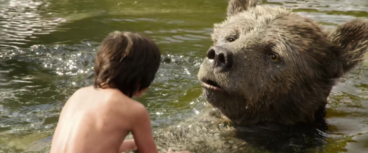 Baloo (Bill Murray) and Mowgli (Neel Sethi) in 'The Jungle Book'. (Credit: Disney)
