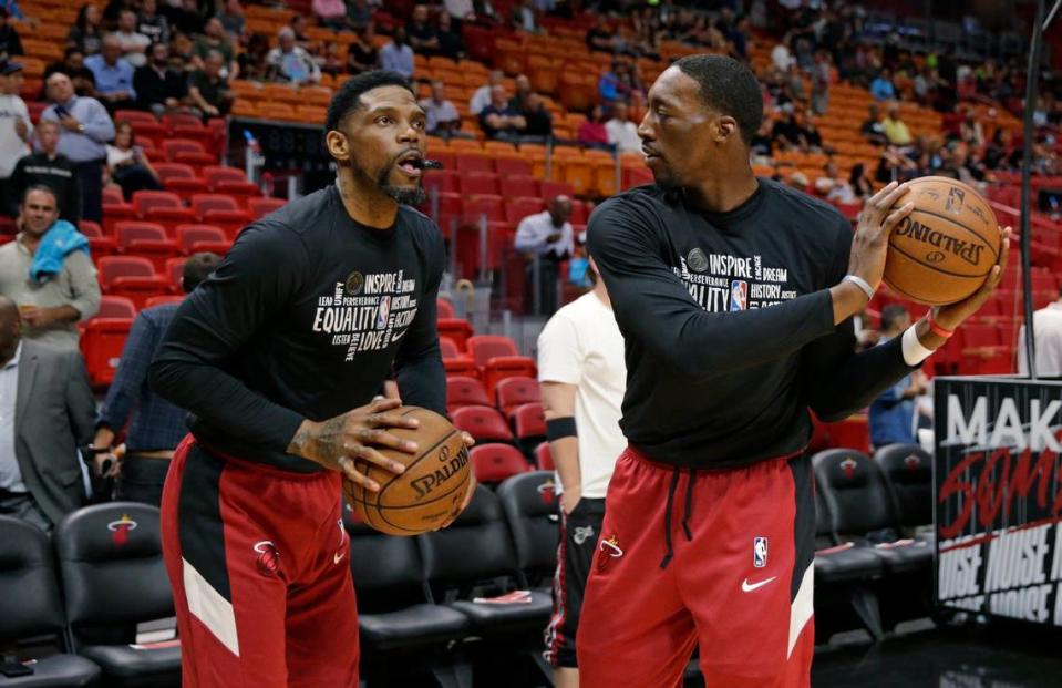 Miami Heat center Bam Adebayo (13) and Heat forward Udonis Haslem (40) talk before the start of a game against the Minnesota Timberwolves at AmericanAirlines Arena on February 26, 2020.