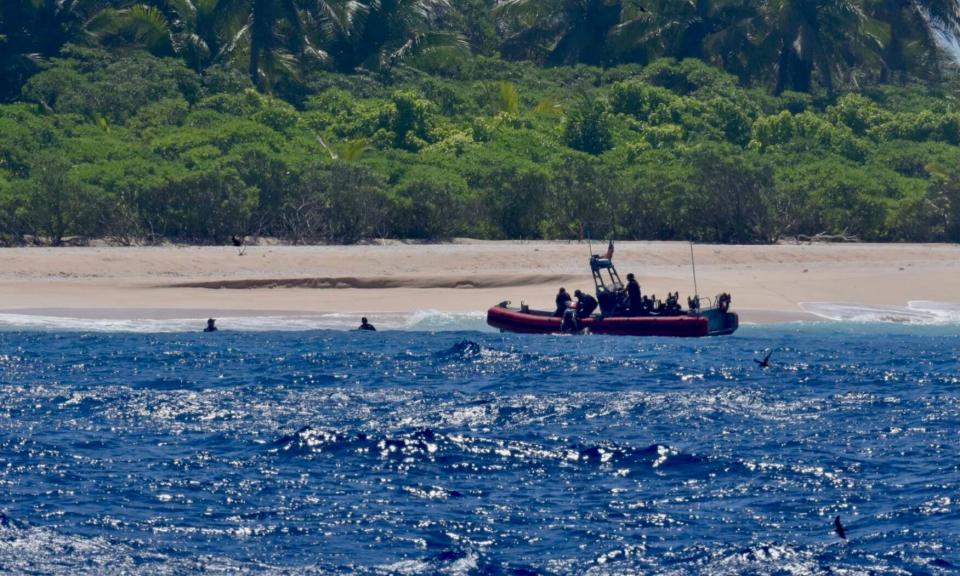 The crew of USCGC Oliver Henry rescues three mariners stranded on Pikelot Atoll, Yap State, Federated States of Micronesia, on April 9, 2024.