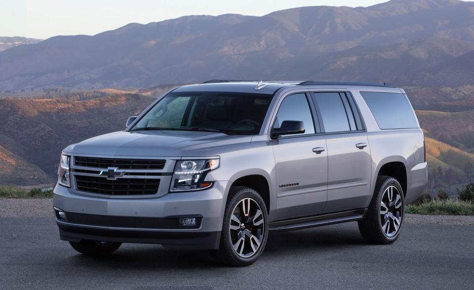 <p>Did you know <a rel="nofollow noopener" href="https://www.caranddriver.com/chevrolet/suburban" target="_blank" data-ylk="slk:the Suburban;elm:context_link;itc:0;sec:content-canvas" class="link ">the Suburban</a> nameplate has been around since 1935? That fun fact aside, the longer of Chevrolet's two full-size SUVs (the Tahoe being the shorter one) performs its duties for American families like it has for decades, and at a reasonable-for-the-class cost. (The 'burban's relative affordability more functional size place it ahead of its Tahoe sibling and its GMC and Cadillac cousins in our rankings.) A 355-hp V-8 and six-speed automatic transmission come standard; a 420-hp V-8 with a 10-speed automatic is available. In its most tow-friendly configuration, the Suburban can lug up to 8300 pounds, while the cabin can tote up to nine passengers.</p>