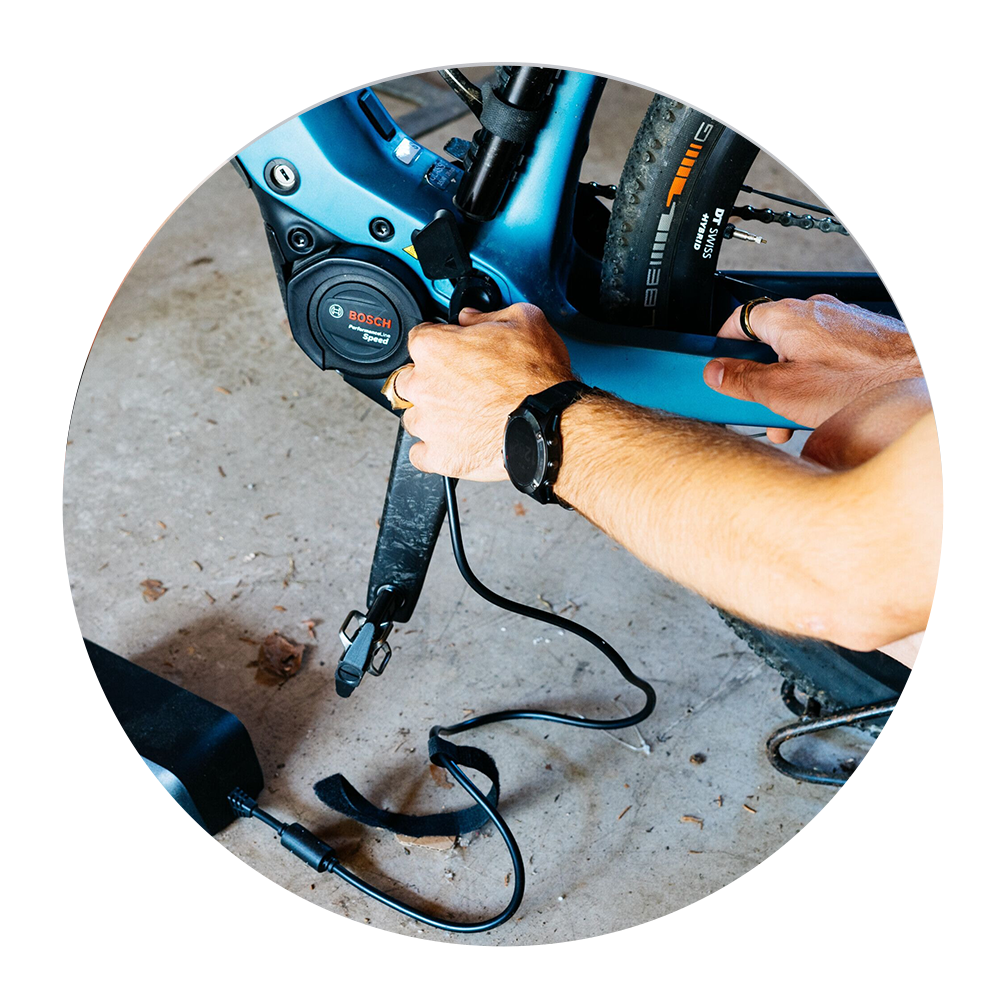 a person working on an ebike