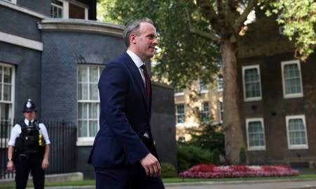 Newly appointed Britain's Foreign Secretary Dominic Raab leaves Downing Street, in London