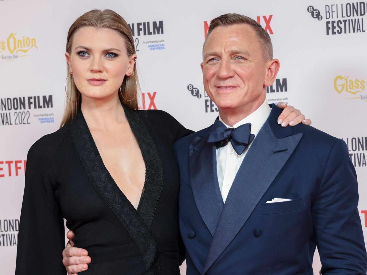 Vianney Le Caer/Invision/AP/Shutterstock Ella Loudon and Daniel Craig in 2022.