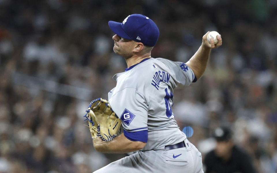 Dodgers reliever Daniel Hudson delivers during the ninth inning Friday.