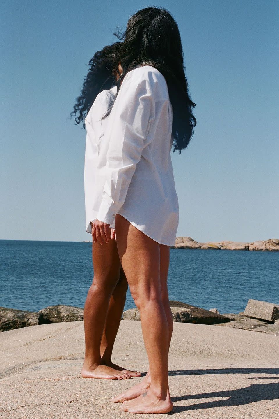 a person standing on a beach