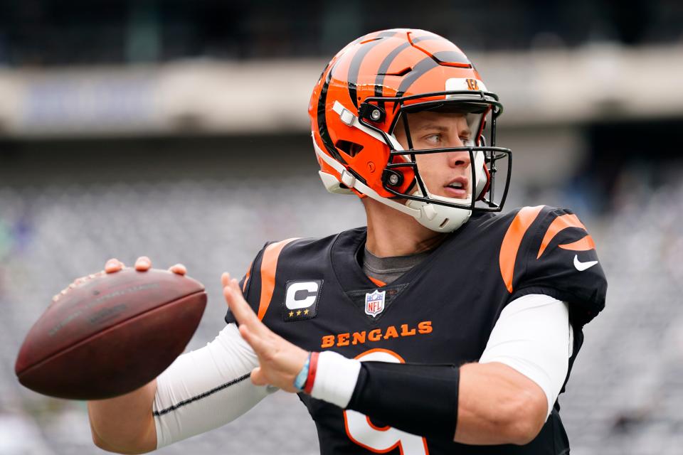 Cincinnati Bengals quarterback Joe Burrow (9) throws during warmups at MetLife Stadium on Sunday, Sept. 25, 2022. 