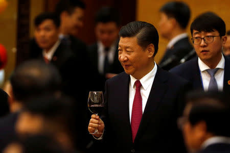 China's President Xi Jinping raises a toast at a State Banquet to welcome him in Hanoi, Vietnam November 12, 2017. REUTERS/Kham