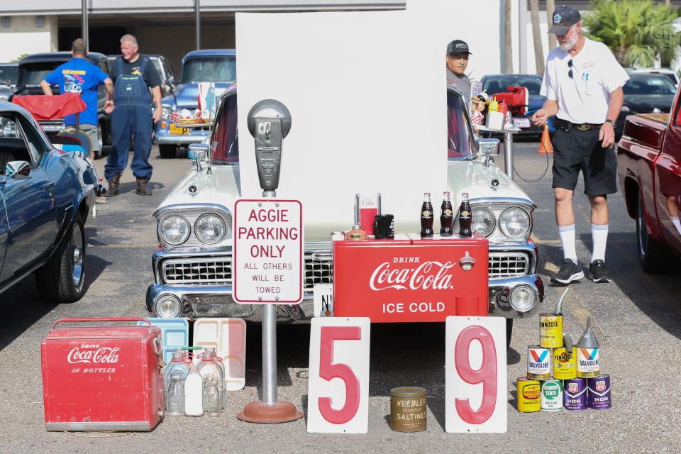 "Candy," a 1959 Ford Galaxie Fairlane 500, has been in Michael Humbach's (right) family for more than 60 years. His vehicle was registered to compete in the 29th annual Coastal A's & Rod's Fun Run car show Saturday, May 28, 2022.