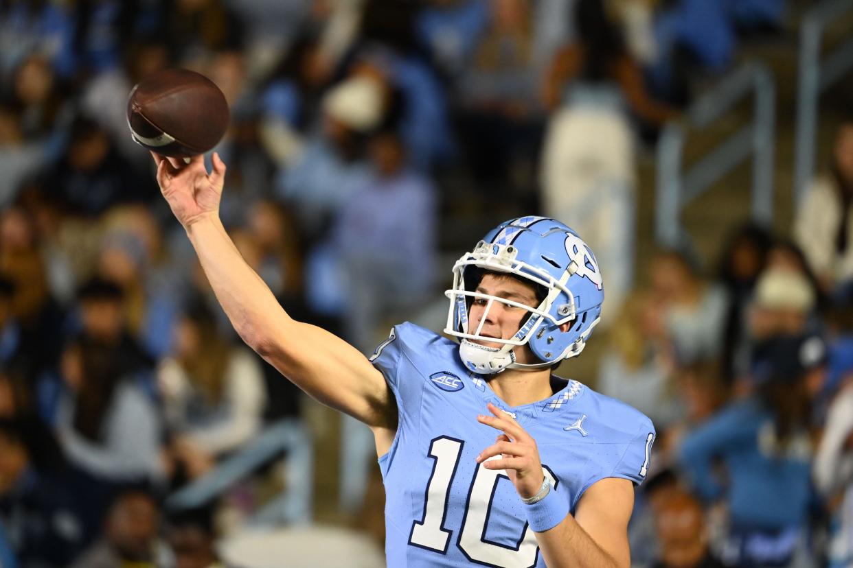 Nov 11, 2023; Chapel Hill, North Carolina, USA; North Carolina Tar Heels quarterback Drake Maye (10) warms up before the game at Kenan Memorial Stadium. Mandatory Credit: Bob Donnan-USA TODAY Sports