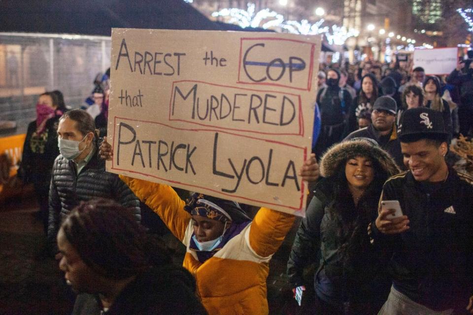 People protest against the police shooting of Patrick Lyoya in Grand Rapids, Michigan, on 13 April (AP)