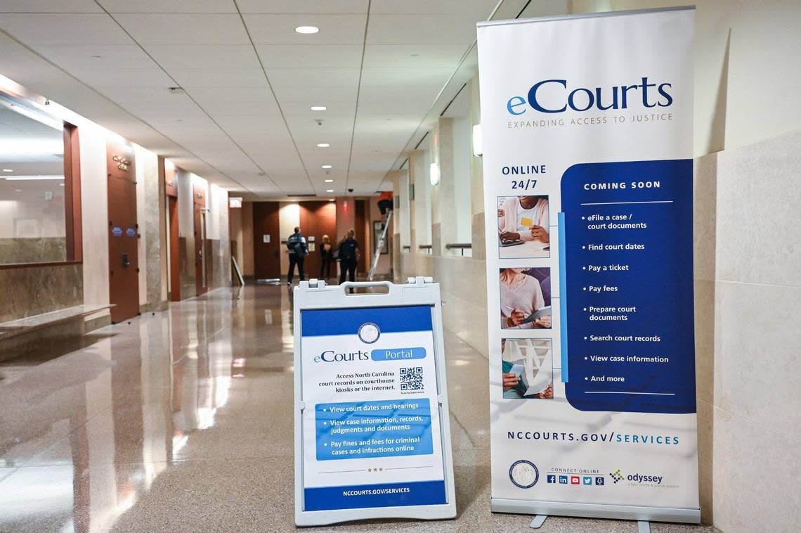 Signs annoucing eCourts coming soon are displayed throughtout the Mecklenburg County Courthouse on Sept. 21, 2023. Software from Tyler Technologies, eCourts, launched in Mecklenburg County in October. It was piloted in Wake, Harnett, Johnston and Lee Counties.