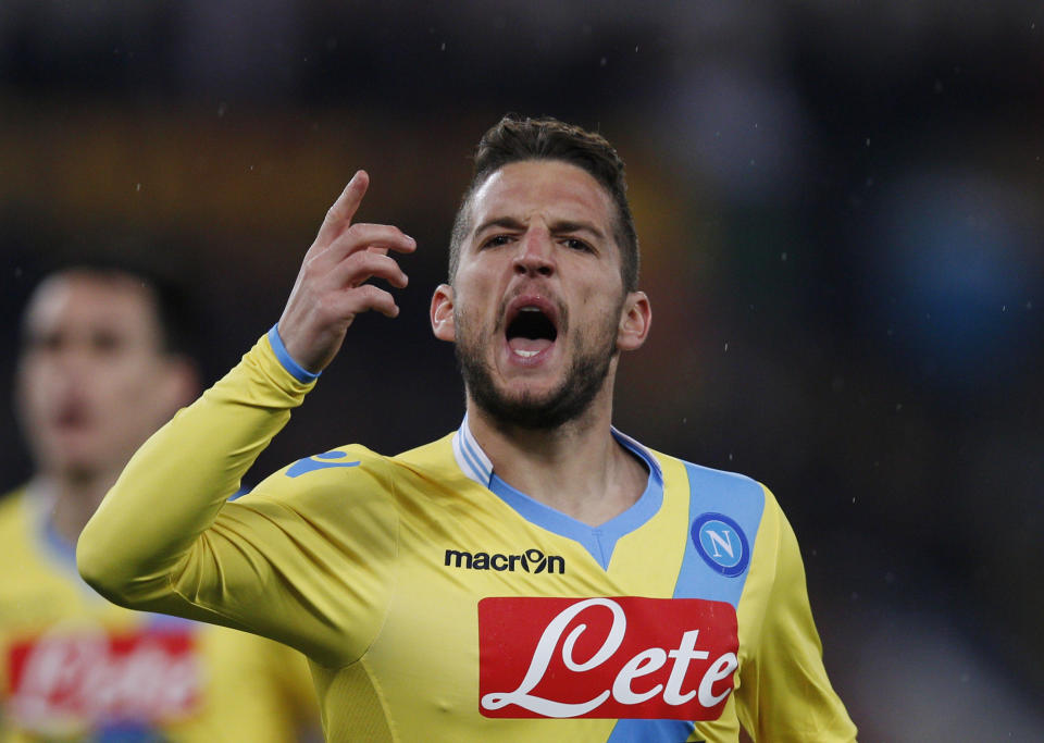 Napoli's Dries Mertens right celebrates after scoring during an Italian Cup, semifinal first leg match, between AS Roma and Napoli at Rome's Olympic stadium, Wednesday, Feb. 5, 2014. (AP Photo/Alessandra Tarantino)