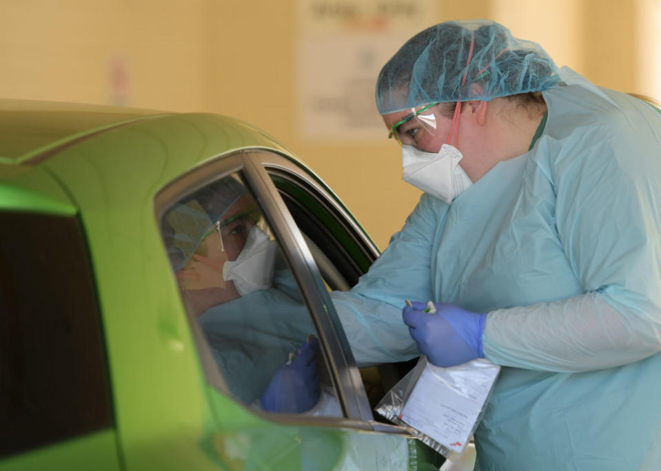 Health staff conduct tests at the COVID-19 testing centre in the Reactivating the Repat Hospital  in Adelaide, Australia.