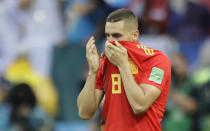 <p>Koke is hides his face in shirt after having Spain’s first penalty saved in the shootout </p>