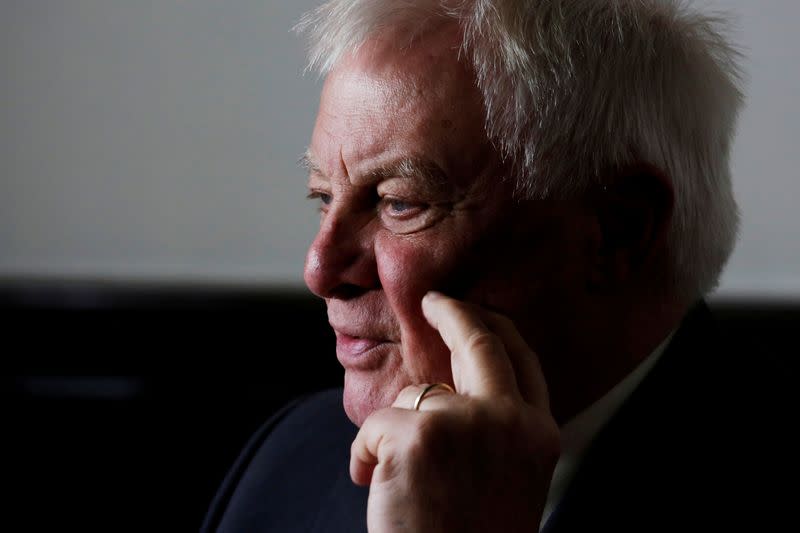 FILE PHOTO: Former Hong Kong governor Chris Patten attends an interview in Hong Kong