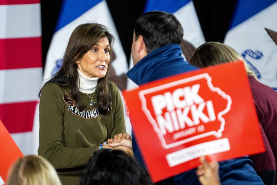 Former U.N. Ambassador Nikki Haley greets supporters during a campaign stop Saturday, Jan. 13, 2024, at The James Theater in Iowa City, Iowa.