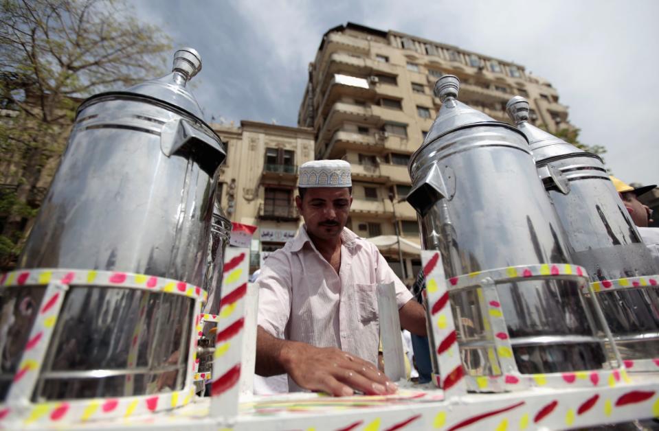 Waleed Ahmed el-Sayed, 31, who received a BA in social services from Assyiut University in 2004, sells juice in Tahrir square in Cairo