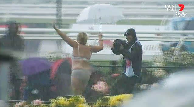 A happy streaker brightened a dreary Melbourne day at Flemington. Photo: 7 Sport