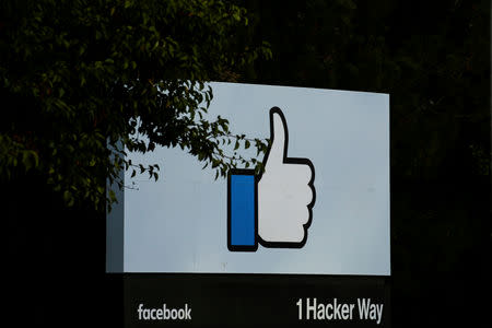 FILE PHOTO: The entrance sign to Facebook headquarters is seen in Menlo Park, California, on Wednesday, October 10, 2018. REUTERS/Elijah Nouvelage/File Photo