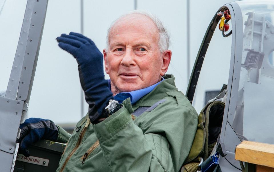 Second World War pilot Hugo Broch making his maiden voyage in a Spitfire at Biggin Hill. - Credit: Neil Genower/historyhit.tv/PA