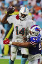Buffalo Bills defensive end A.J. Epenesa (57) sacks Miami Dolphins quarterback Jacoby Brissett (14), during the first half of an NFL football game, Sunday, Sept. 19, 2021, in Miami Gardens, Fla. (AP Photo/Hans Deryk)