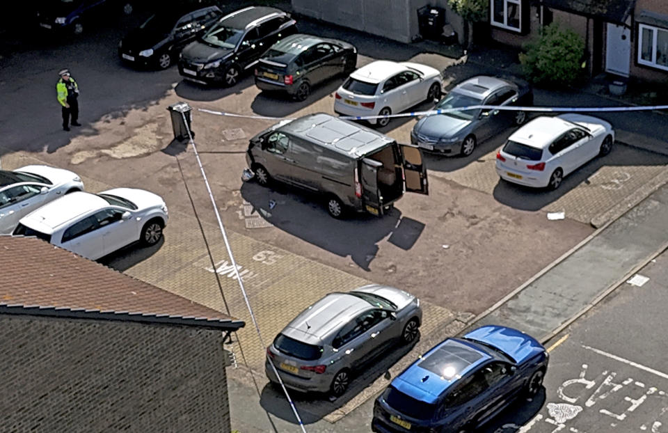 A police cordon around a van on Laing Close in Hainault, north east London, following the stabbings. (PA)