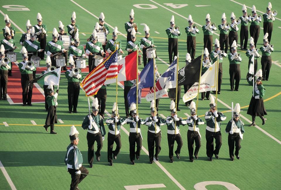 The Mighty St. Joe's Alumni Corps takes the field in an exhibition performance in Hornell.
(Photo: The Evening Tribune)