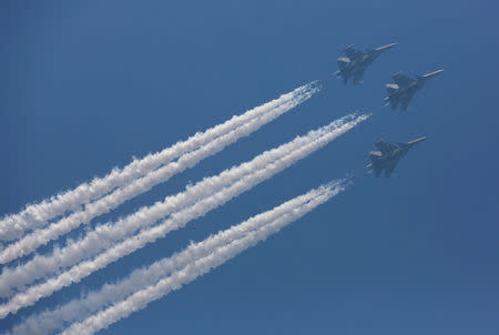 FILE PHOTO: The Indian Air Force's Russian-made Sukhoi-30 aircraft fly past during the Republic Day parade in New Delhi, India, January 26, 2018. REUTERS/Adnan Abidi/File photo