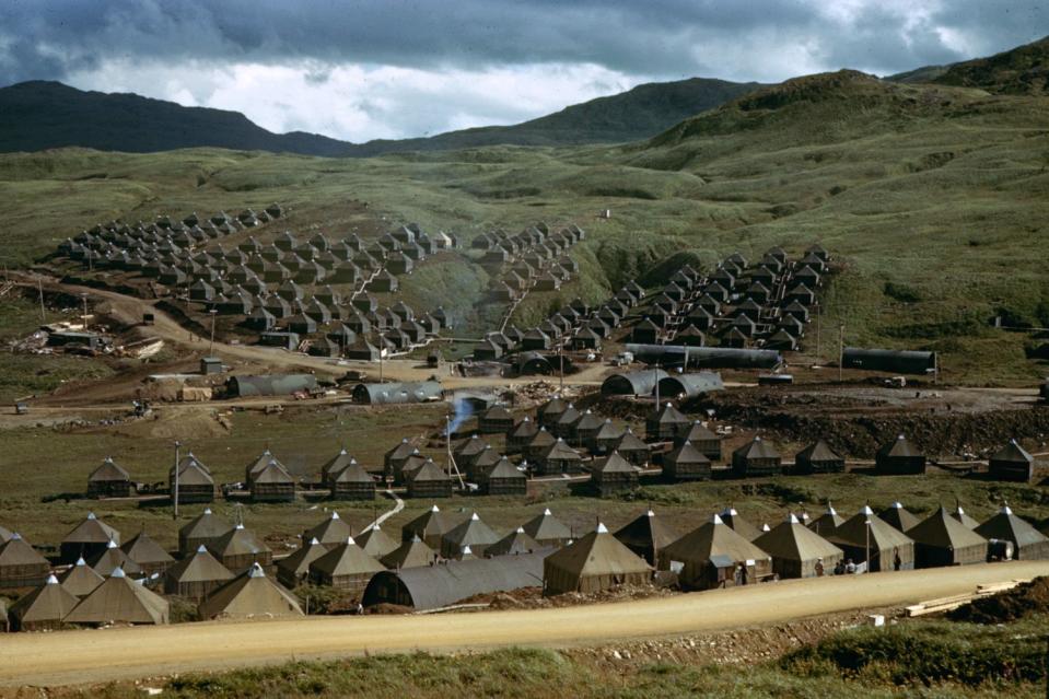 Tents housing Seabees (members of the U.S. Navy's Construction Battalion), Adak Island during World War II, 1943. Among the first to land on Adak, Attu, Kiska and Amchitka, the Seabees -- carpenters, mechanics, electricians, welders boilerman, and plumbers -- built airfields, roads, barracks and wharves.