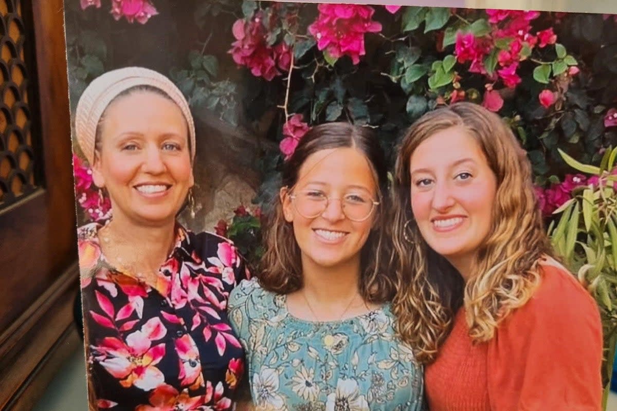 Lucy Dee, 48, with her two daughters, Rina, 15 and Maia, 20, all murdered in the West Bank on April 7, 2023. (PA)