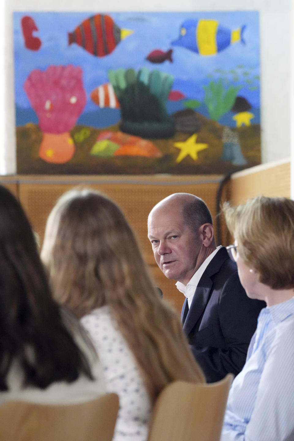 German Chancellor Olaf Scholz visits the Eigenherd School on the occasion of the EU Project Day, in Kleinmachnow, Germany, Monday, May 22, 2023. Scholz on Monday sharply criticized climate protesters for drastic actions such as blocking streets or gluing themselves to famous paintings in museums. “I think it’s completely nutty to somehow stick yourself to a painting or on the street,” Scholz said during a visit at an elementary school in the town of Kleinmachnow outside of Berlin, German news agency dpa reported. (Soeren Stache/dpa via AP)