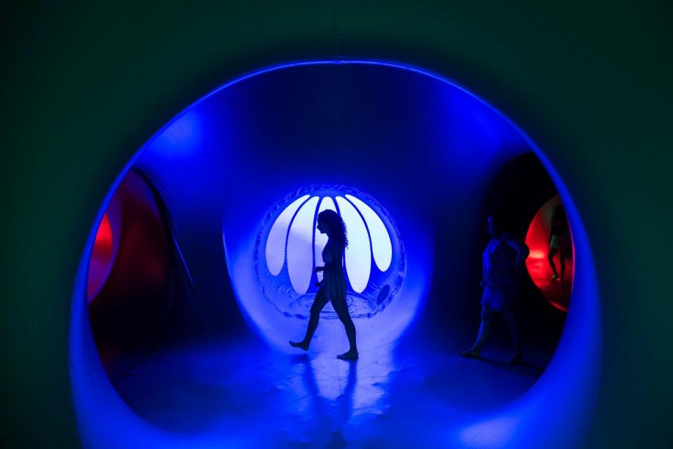 A visitor walks through an art installation at Sziget Festival in Budapest (EPA)