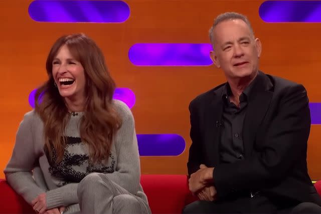 <p>The Graham Norton Show/YouTube</p> Tom Hanks and Julia Roberts sit together during 'The Graham Norton Show'