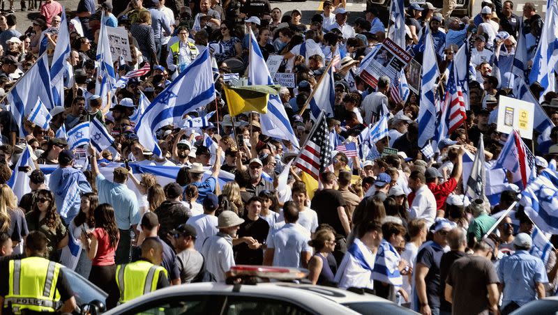 Israel supporters gather during a march in West Los Angeles in front of the Simon Wiesenthal Center and Museum of Tolerance on Oct. 15, 2023. Police are investigating fights that erupted among pro-Israeli and pro-Palestinian demonstrators on streets outside Los Angeles’ Museum of Tolerance after a private screening of video showing the Oct. 7 attack on Israel by Hamas militants.