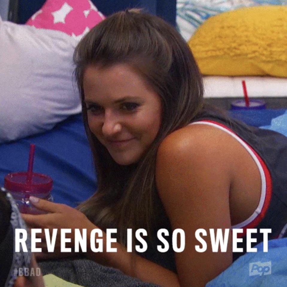 A person, smiling mischievously, lies on a bed holding a drink with text overlaid that says, "REVENGE IS SO SWEET." '#BBAD' and 'Pop' logos are in the corners