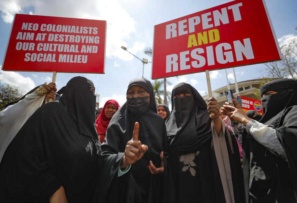 People hold placards as they chant slogan during a protest against a ruling by the Kenya supreme court for upholding the National Gay and Lesbian Human Rights Commission (NGLHRC) to register the association in Nairobi, Friday Oct. 6 2023. The protests took place after the Friday prayers with demonstrator’s calling out Kenya’s highest court for “condoning immorality.” (AP Photo/Brian Inganga)