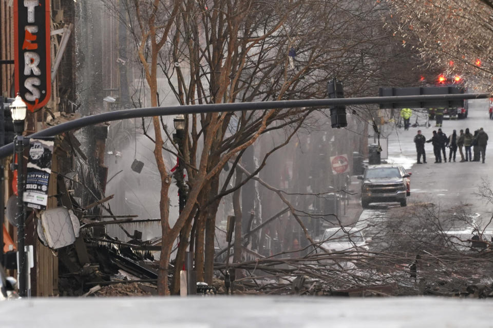 Emergency personnel work at the scene of an explosion in downtown Nashville, Tennessee, on Dec. 25, 2020. / Credit: Mark Humphrey / AP