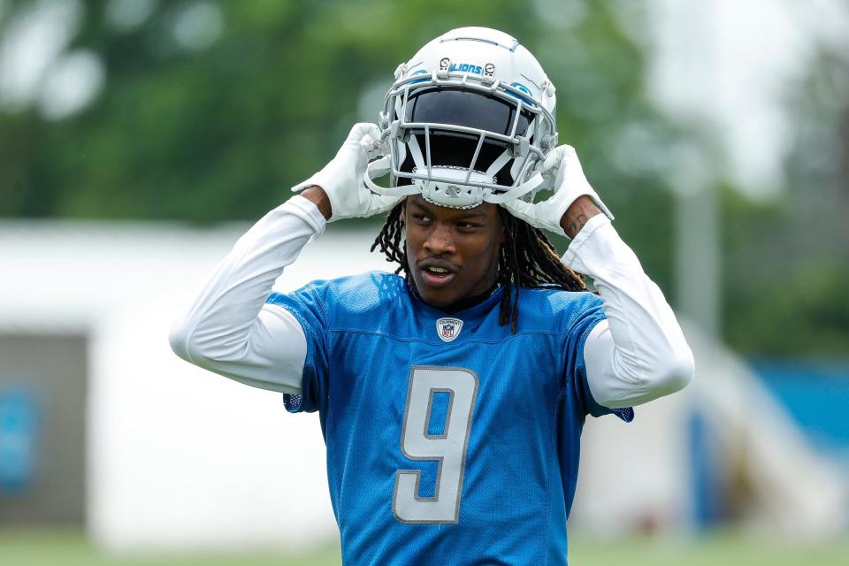 Detroit Lions wide receiver Jameson Williams walks off the field after practice during minicamp at Detroit Lions Headquarters and Training Facility in Allen Park on Tuesday, June 6, 2023.