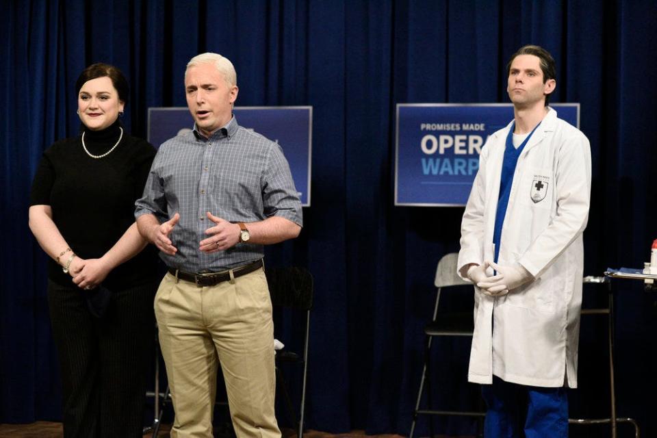 Pictured: (l-r) Lauren Holt as Karen Pence, Beck Bennett as Mike Pence, and Mikey Day as a healthcare worker during the "Pence Gets The Vaccine" Cold Open on Saturday, December 19, 2020.