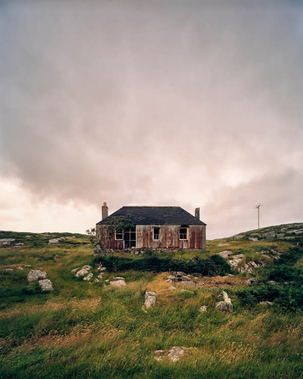 Mandatory Credit: Photo by Deadline News/REX_Shutterstock (4805408g) One of John Maher's photos of abandoned homes on the Western Isles Photos taken by Buzzcocks drummer John Maher could bring abandoned island homes back to life, Scotland - May 2015 *Full story: http://www.rexfeatures.com/nanolink/qfyt Pictures taken by the former drummer of the Buzzcocks are set to bring up to 1,000 abandoned island homes back to life. Eerily beautiful pictures of the derelict croft houses slowly rotting away in the Western Isles were taken by former Buzzcocks drummer John Maher. The remarkable images featured in an exhibition and have now led to talks with one of the worldï¿½s biggest charitable foundations, The Carnegie Trust, in a bid to make them habitable again. There are about 1,000 empty properties frozen in time, many of which have been empty since their owners passed away or moved to the mainland. Meanwhile there is a big housing problem with around 1,000 people waiting for a home on the islands. A housing agency now plans to renovate the first properties this autumn in a project that could save the islandsï¿½ dwindling rural communities. 