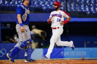 Dominican Republic's Jose Bautista score during a baseball game against Israel at the 2020 Summer Olympics, Tuesday, Aug. 3, 2021, in Yokohama, Japan. (AP Photo/Matt Slocum)