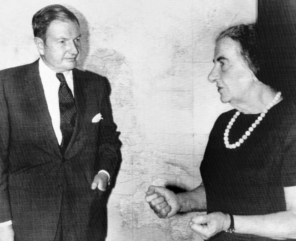 FILE - In this March 10, 1971, file photo, David Rockefeller, left, chairman of the Chase Manhattan Bank, talks with Israeli Prime Minister Golda Meir after his arrival in Israel. The billionaire philanthropist who was the last of his generation in the famously philanthropic Rockefeller family died, Monday, March 20, 2017, according to a family spokesman. (AP Photo/File)